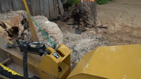 View of the milling head of the stump cutter from the control panel location. Stock Footage 154768754