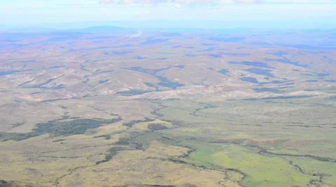 A view into a misty green valley Stock Footage 58630849