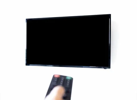 View of mockup black blank space on TV screen isolated on white wall backgrou Stock Photos