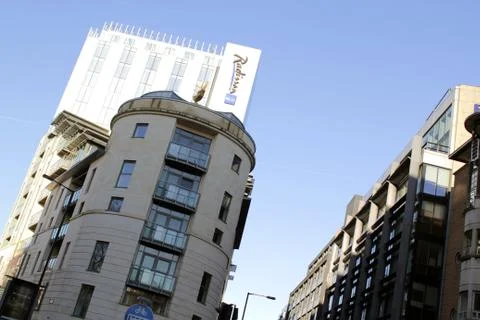 View of modern building and blue sky. Stock Photos