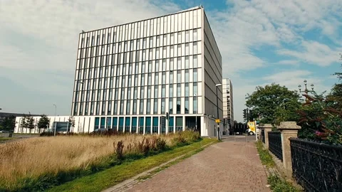View of a modern building from a pathway Video stock 160436765