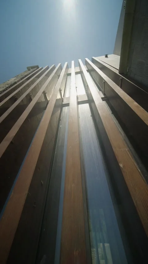 View of a modern loft wall showing its unique architecture and design at midday Stock Footage 327012006