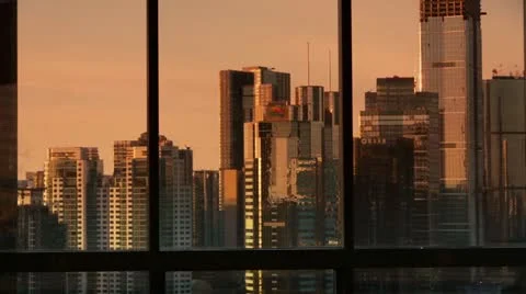 View modern urban high-rise from windows in dusk,business financial center. Stock Footage