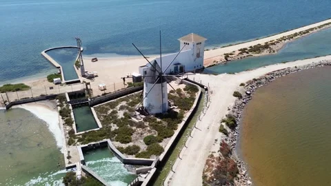 View of Molino la Calcetera Historic Windmill on Mar Menor Salt Pans Spain Stock-Footage 339498173