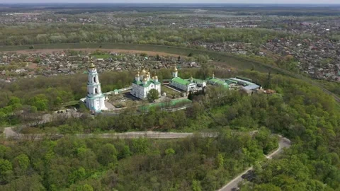 View of the monastery from the air. Large bell tower and gilded domes of the Stock Footage 157204656
