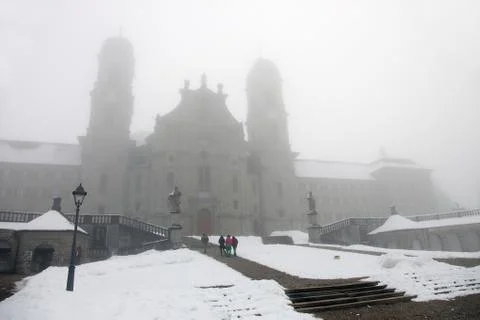 View of Monastery in Einsiedeln in a fog Stock Photos