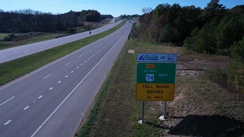 View of the Monroe Express toll road entrance sign. Stock Footage 119703979
