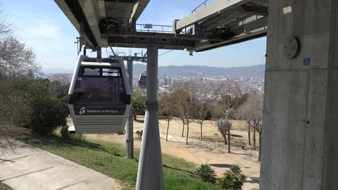 View of Montjuic Cable Car moving in Barcelona touristic destination fun journey Stock Footage 81983169