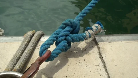 View of a moored boat at a dock on a concrete pier Stock-Footage 113291389