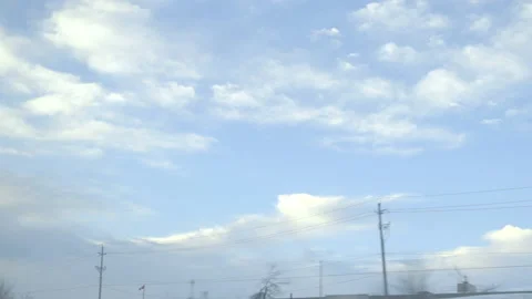 View of the Morning Sky while Driving Stock Footage 147691186