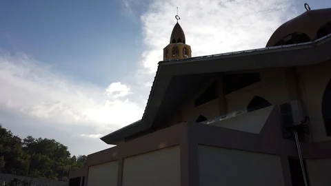 View of mosque on bright sunny day. Tilting up. Stock Footage 101099806