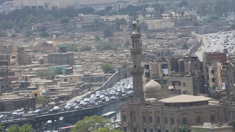 View Of Mosque With Cairo City Traffic Behind Stock Footage 102148530