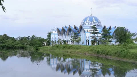 View of a mosque located right beside the lake Stock Footage 237776108