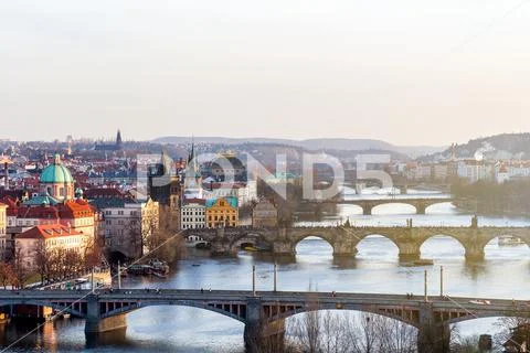 View of the most important bridges in Prague: Charles bridge, Palace bridge.. Stock Photos