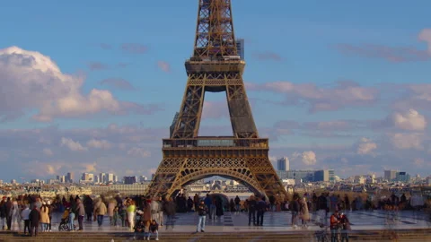 View of the most visited attraction in Paris is the Eiffel Tower. Clouds are Stock Footage 236902011