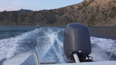 View from motor boat to mountains Stock Footage 130438905