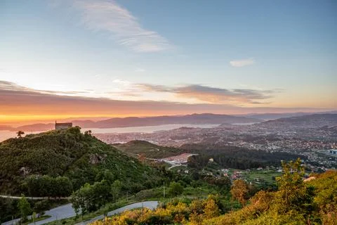 View of Mount Alba at sunset from the viewpoint of Mount Cepudo in Vigo Stock Photos