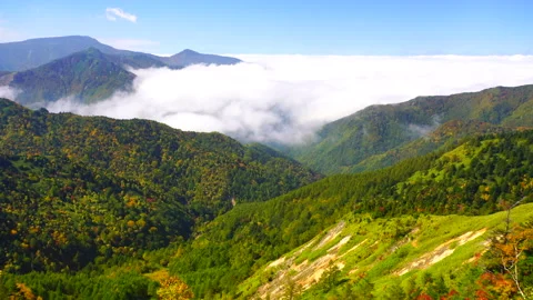 A View of Mount Azuma and Mount Kasa from Below with Autumn Foliage and Sea of Video stock 330983136