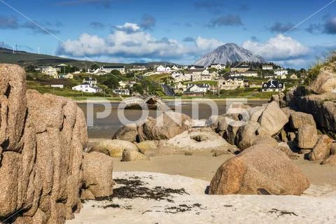 View of Mount Errigal in the distance from the village of Bunbeg Stock Photos