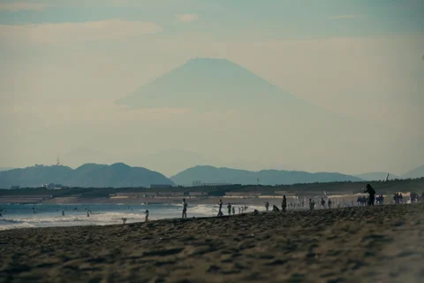 View of Mount Fuji during sunset with warm colors and soft sky tones Stock Footage 321784826