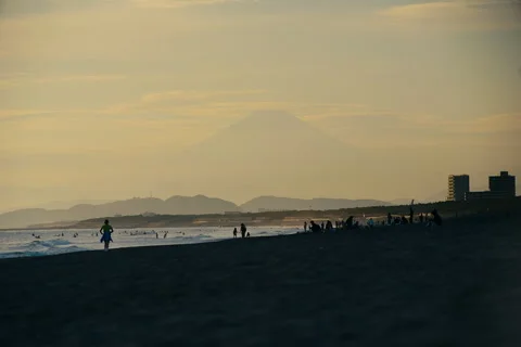 View of Mount Fuji during sunset with warm colors and soft sky tones Stock Footage 321790381