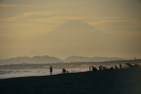 View of Mount Fuji during sunset with warm colors and soft sky tones Stock Footage 321790453