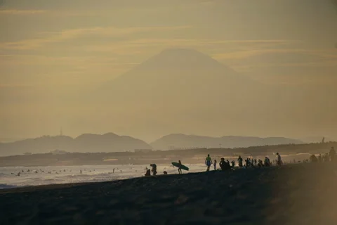 View of Mount Fuji during sunset with warm colors and soft sky tones Stock Footage 321790907