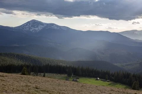 View on the mount Hoverla covered with snow from the Kukul meadow of Chorno.. Stock Photos