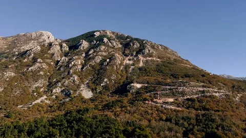 View of Mount Lovcen, you can see the towers of the new cable car Tivat Stock Footage 257014771