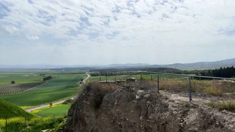 View from Mount Megiddo of fields and farmland outside Tel Megiddo National Park Stock Footage 237602870