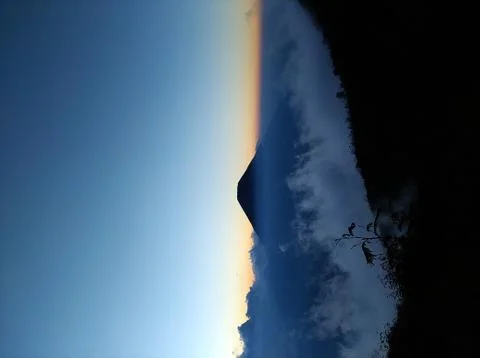 View of Mount Sindoro from the side of Mount Sumbing Stock Photos