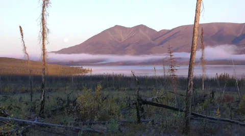 View of a mountain from across a lake Stock Footage 33739714