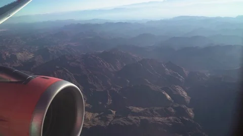 View of mountain from airplane window. 4K Stock Footage 71899998