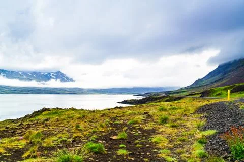 View of mountain and rain clouds in north Iceland Stock Photos