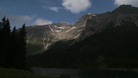 View of a mountain and a river with a cloudy sky Stock Footage 231468631