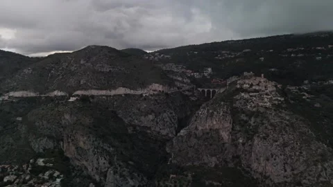 A view of a mountain with a cloudy sky Stock Footage 328478379