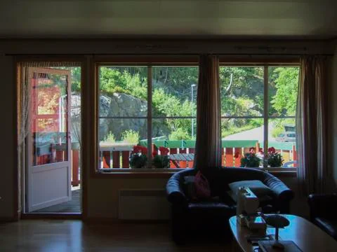 View of the mountain forest from the window of the cottage Stock Photos