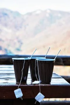 View of the mountain with hot tea refreshment Stock Photos