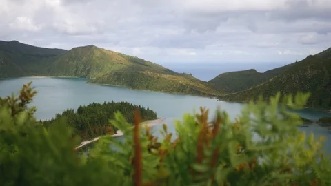 View of a mountain lake in the crater of an extinct volcano of thick green Stock Footage 102147404
