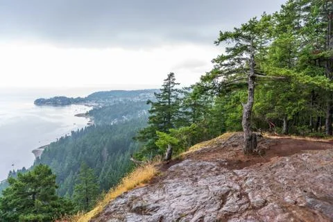 View at Mountain Lake with Dramatic Clouds in British Columbia, Canada. Stock Photos
