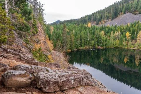 View at Mountain Lake with Dramatic Clouds in British Columbia, Canada. Stock Photos