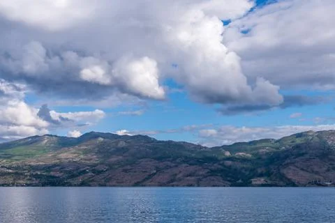 View at Mountain Lake with Dramatic Clouds in British Columbia, Canada. Stock Photos