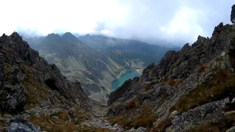 View of a mountain lake from the top of the mountain Stock Footage 82401782