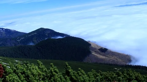 View of mountain landscape. A mist rising from the valley in the distance. Video stock 112610086