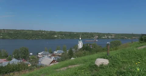 View of the mountain Levitan on the Volga river and Church in the city Plyos Stock Footage 64229076