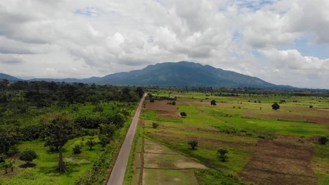 View of a Mountain with a long road Stock Footage 117369128