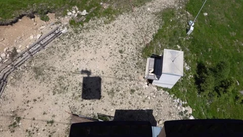 A view of the mountain nature under the cable car with a shadow Stock Footage 203718526