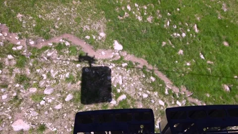 A view of the mountain nature under the cable car with a shadow Stock Footage 203718779