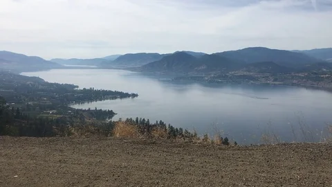View from mountain over lake Stock Footage 79861285