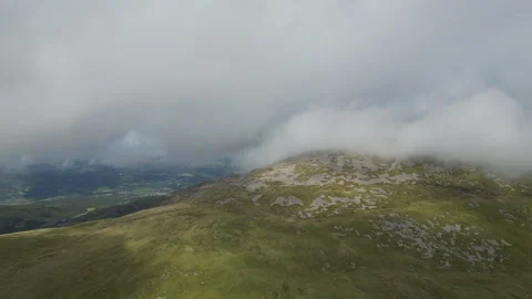 A view of the mountain peak hidden in the clouds. Stock Footage 250397405